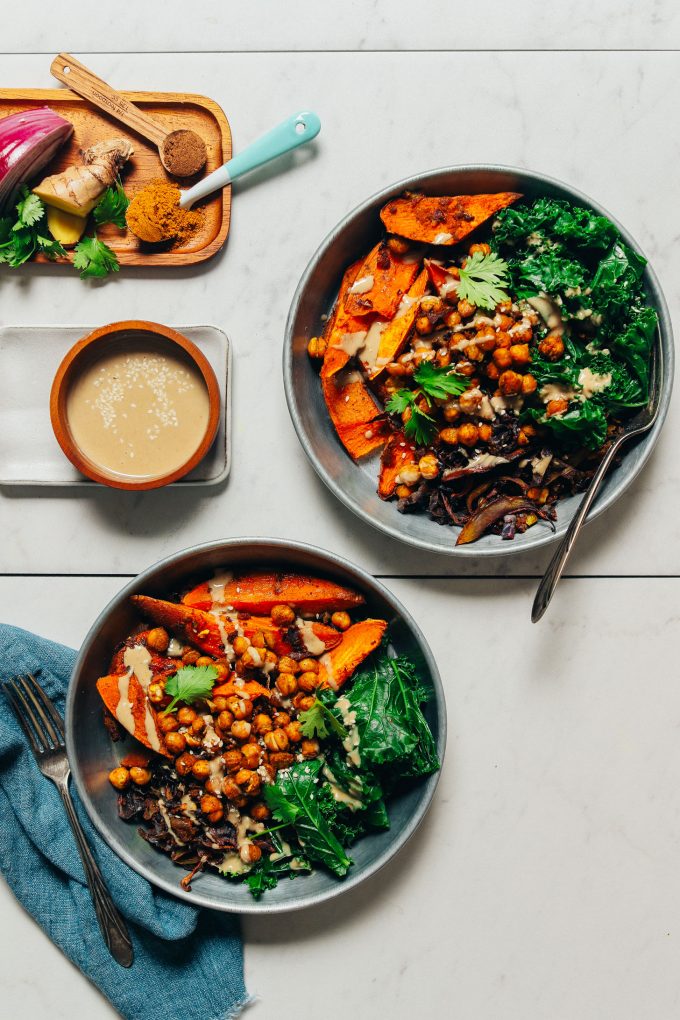 Curried Sweet Potato and Chickpeas in bowl with fork and teal napkin