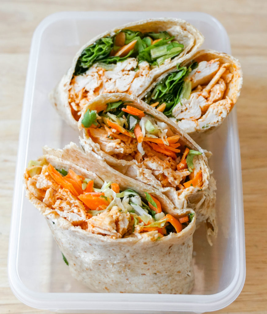 image of Thai Chicken Wraps in a meal prep container for a picnic