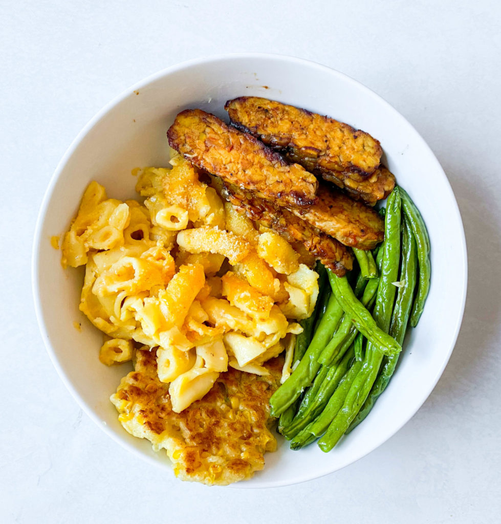 Vegetarian BBQ meal prep with BBQ tempeh, mac and cheese, and green beans 