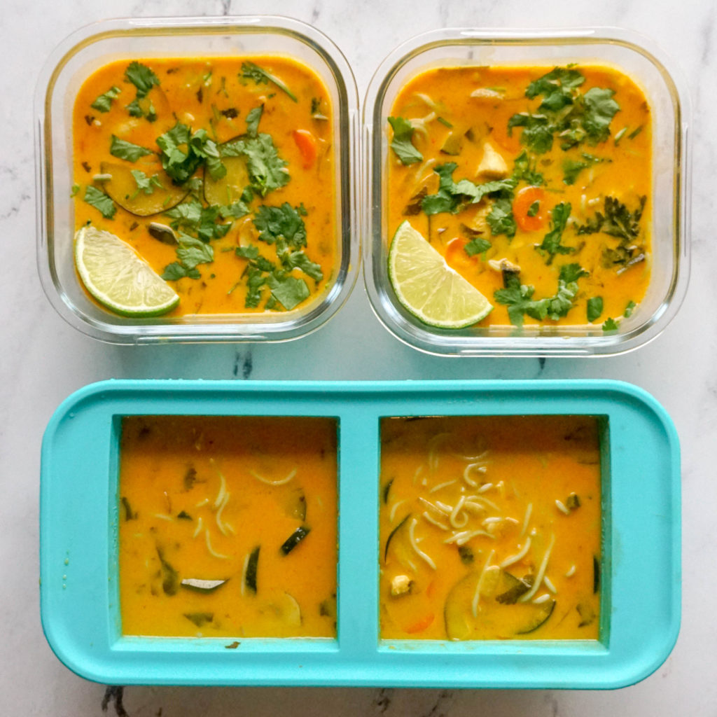 coconut curry soup in glass bowls