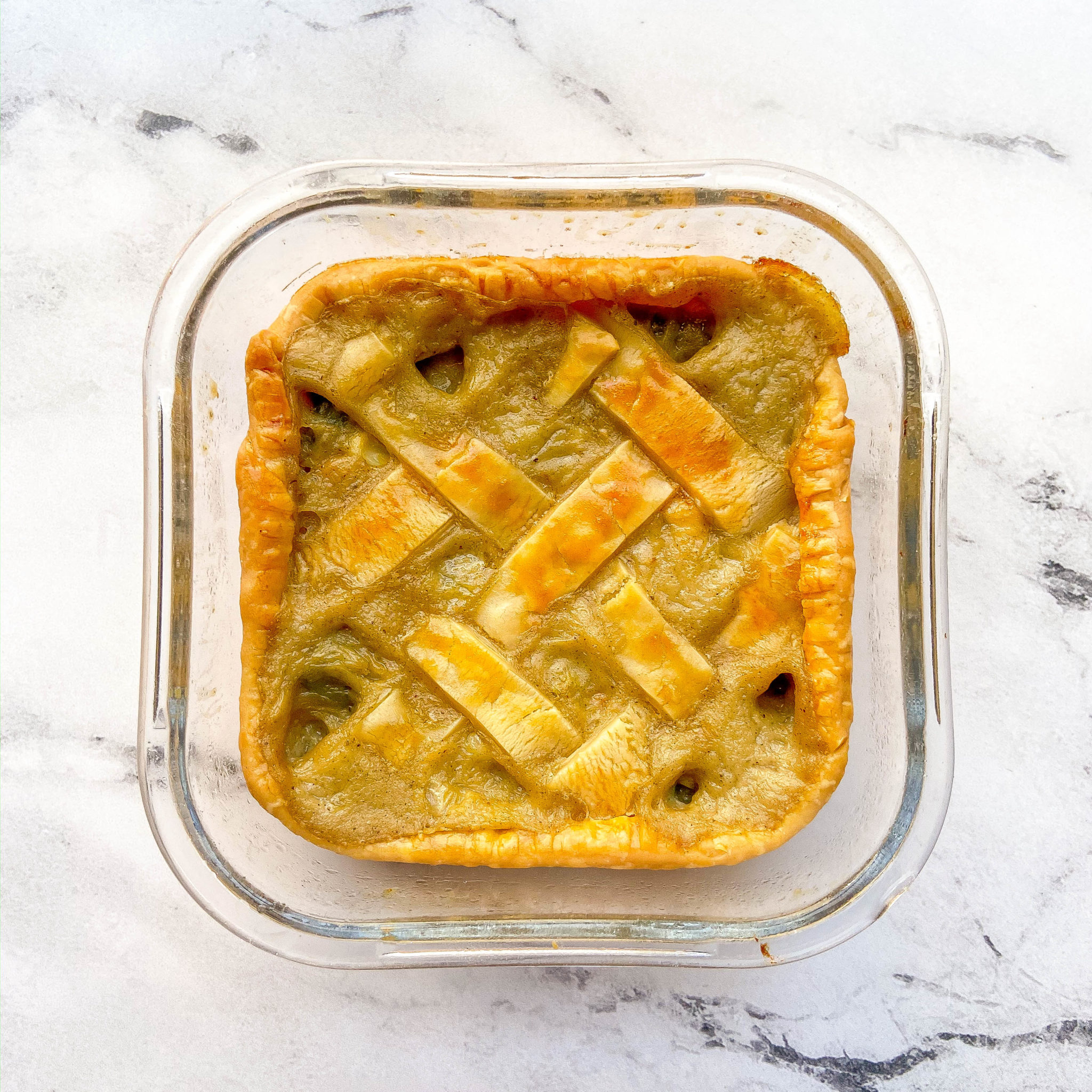 One square container with an individual chicken pot pie