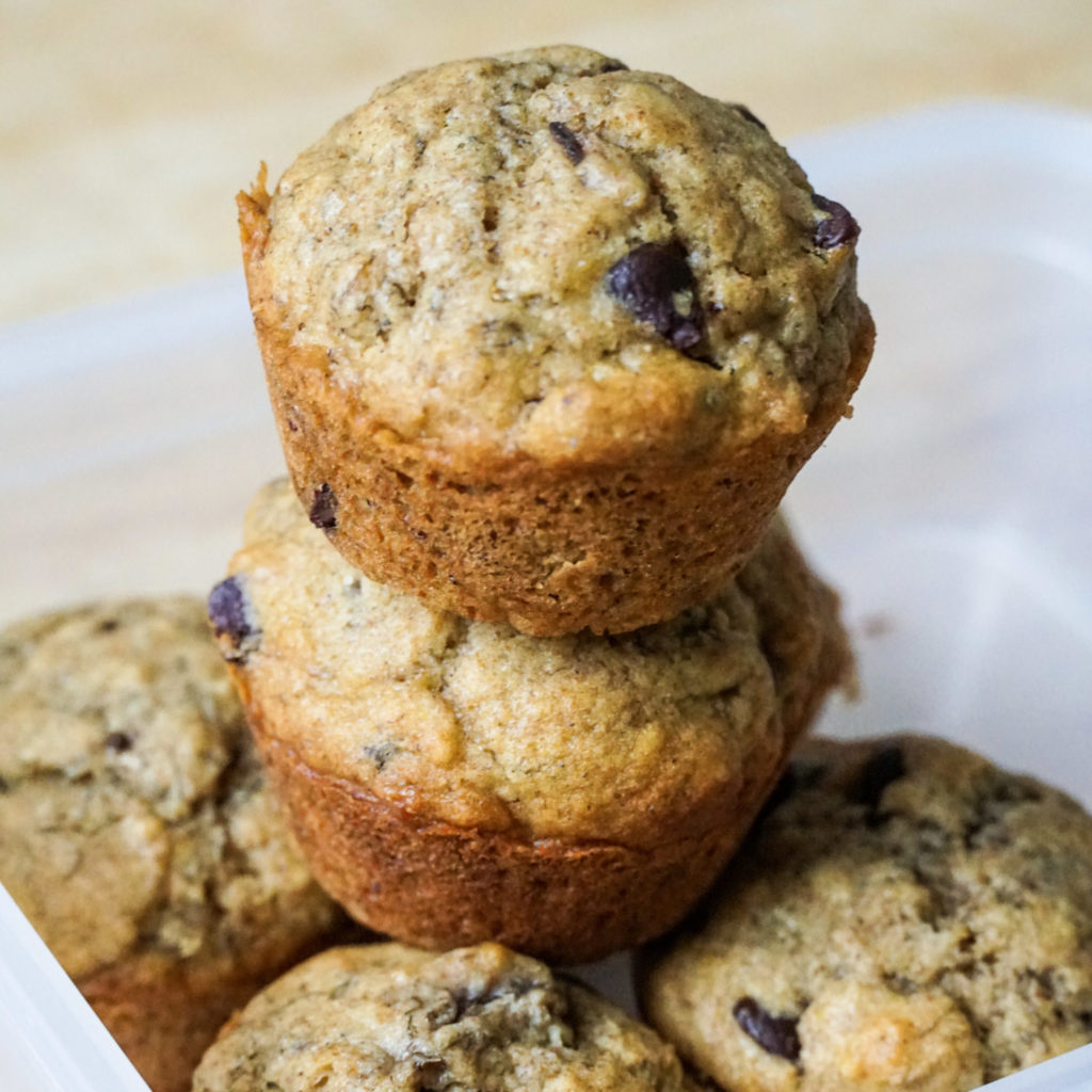 Easy Banana Muffins stacked on top of each other 