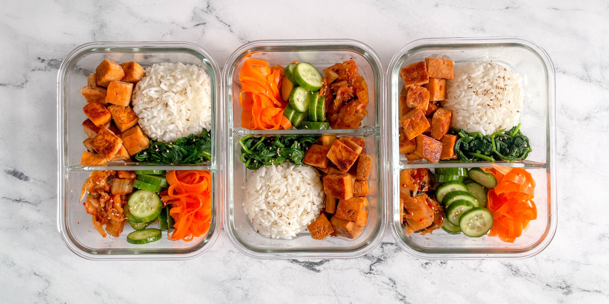 Vegetarian Bibimbap bowls in three meal prep containers