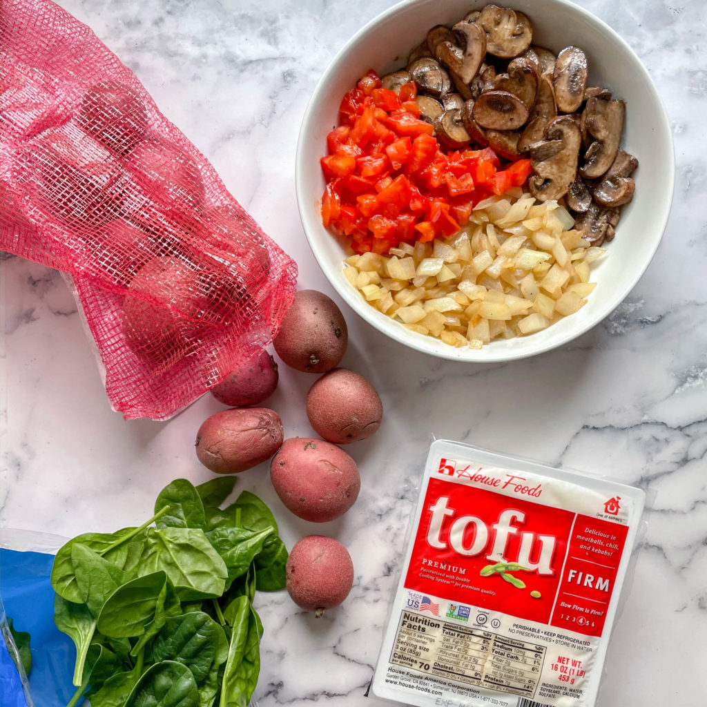 Ingredients to make a breakfast tofu scramble with firm tofu