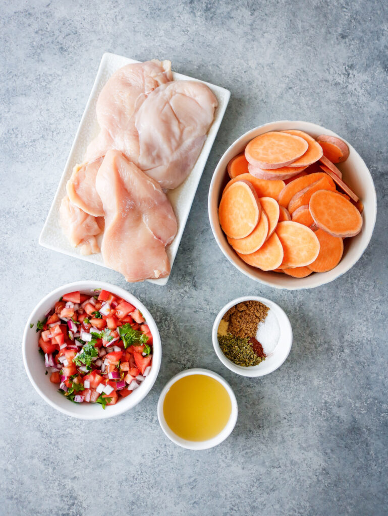 Instant Pot Chicken Carnitas Nachos Ingredients Ingredients for Instant Pot chicken carnitas nachos laid out on a surface