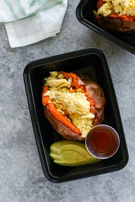 Scrambled eggs and sweet potatoes meal prep in a container